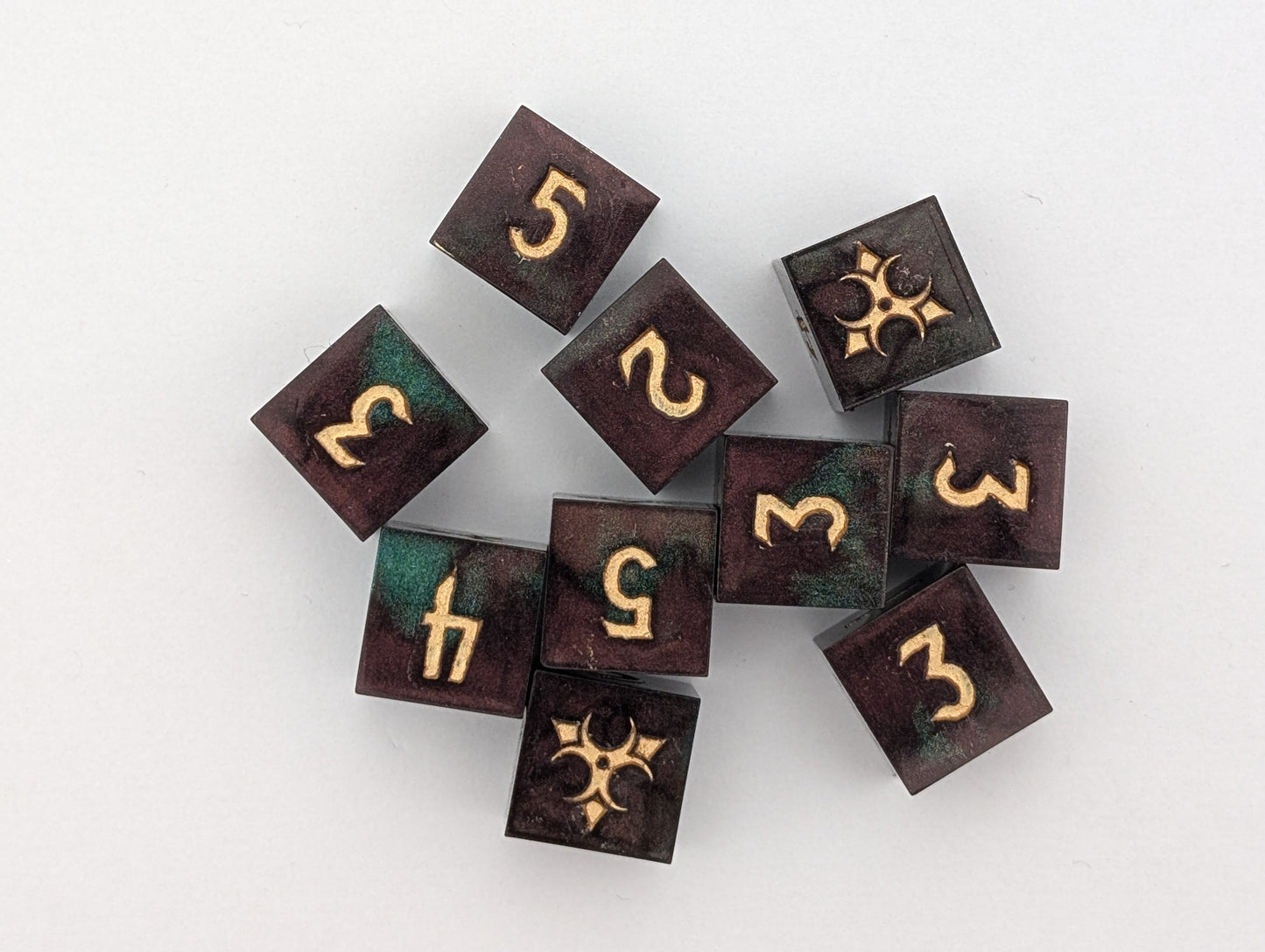 Red and green metallic toxic dice