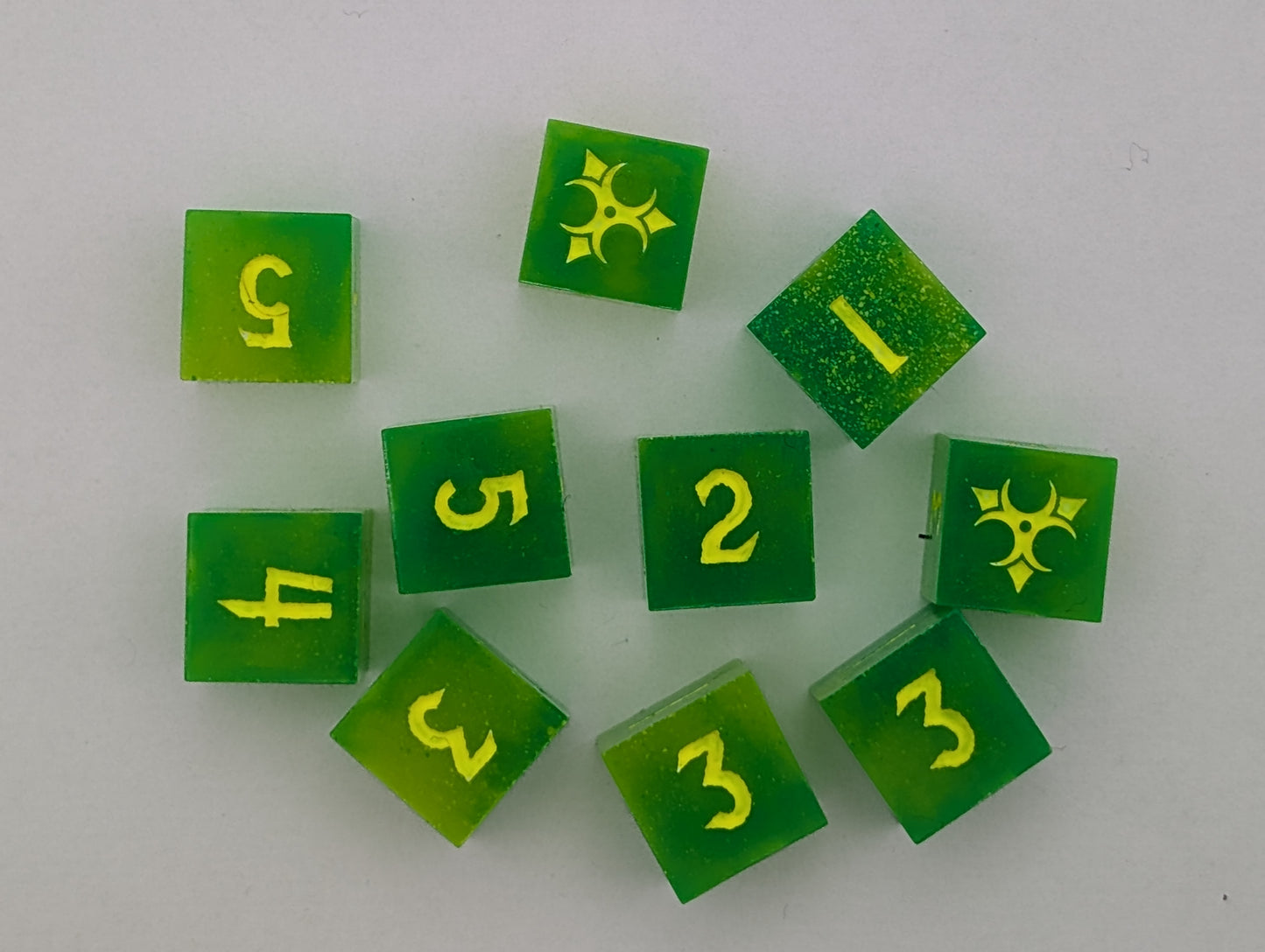 Green and yellow florescent toxic dice