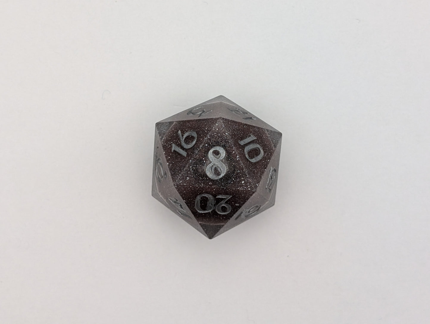 Silver flakes and maroon liquid core 38mm chonk